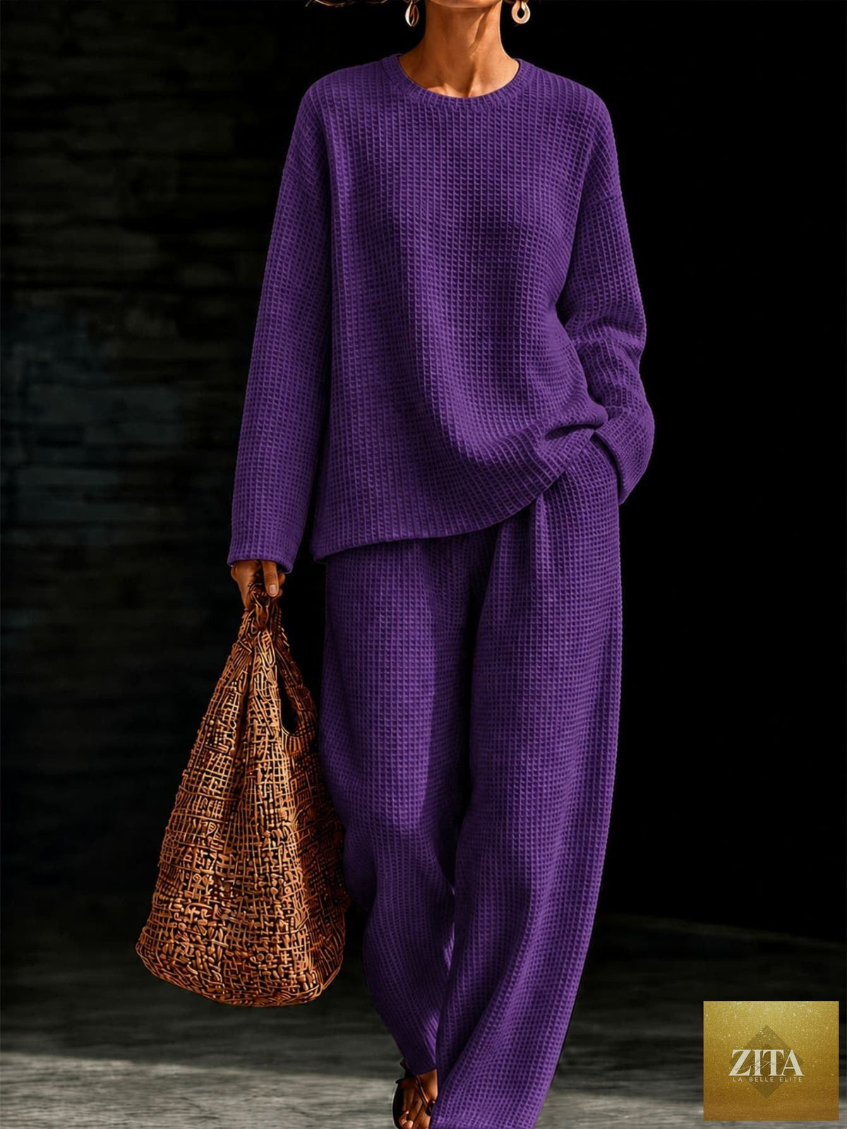 Women's waffle knit oversized crew-neck pullover and relaxed wide-leg trousers lounge co-ord set by MERIDGE, shown in a cozy, casual fit.
