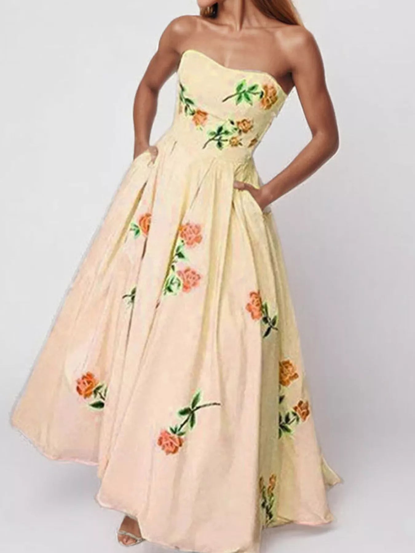 Floral print tube maxi dress by Shopiebay featuring a fitted bodice and flowing skirt, perfect for summer or special occasions.