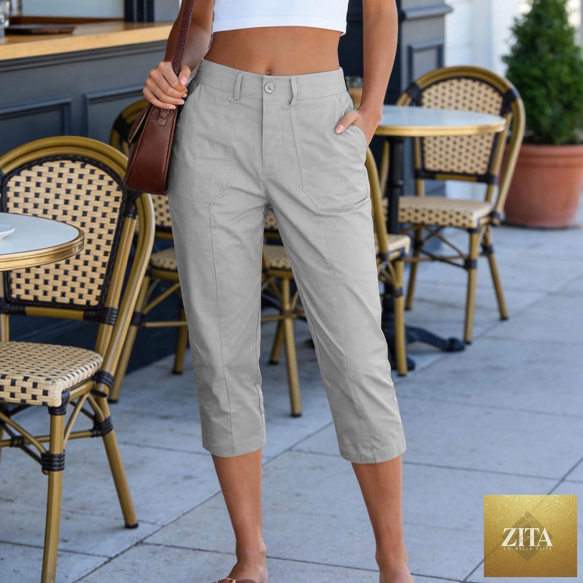 Women's high waist cargo capris with patch pockets, summer casual cropped pants by Sell My Stuff, styled for work or leisure.