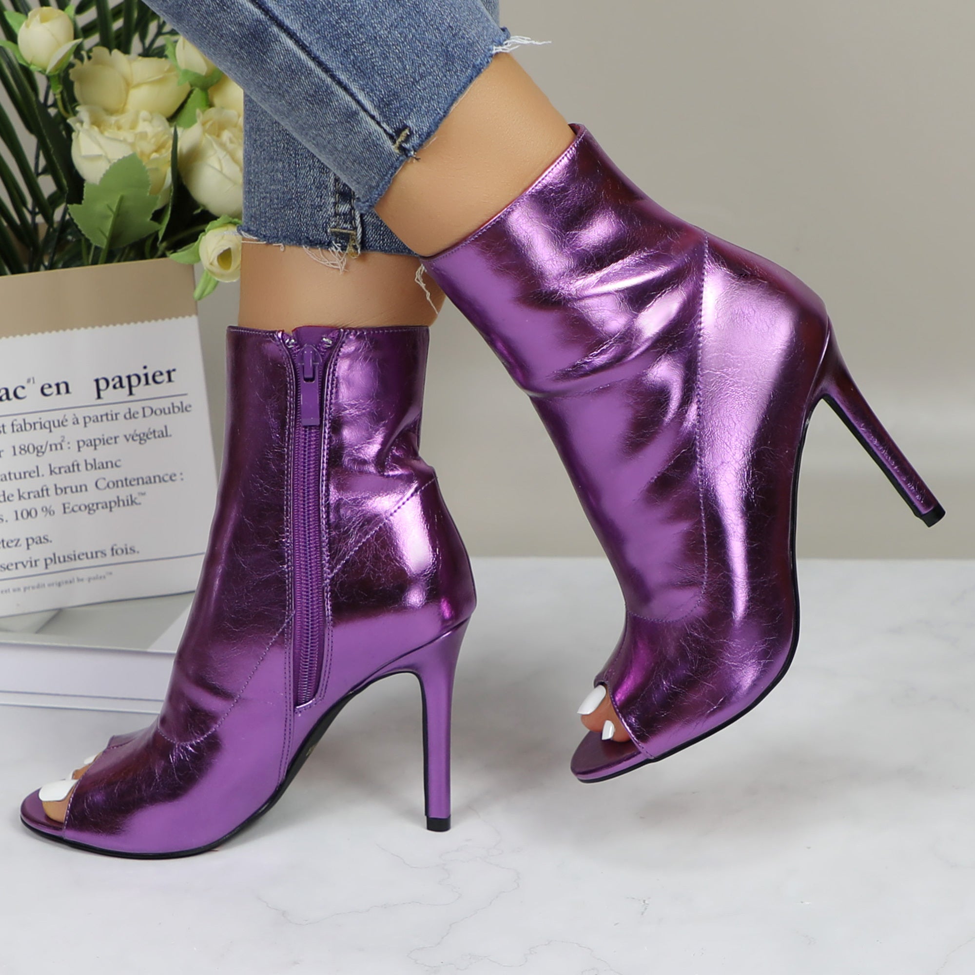 Shiny metallic stiletto boots for women with a sleek design, perfect for dance parties and stylish occasions.