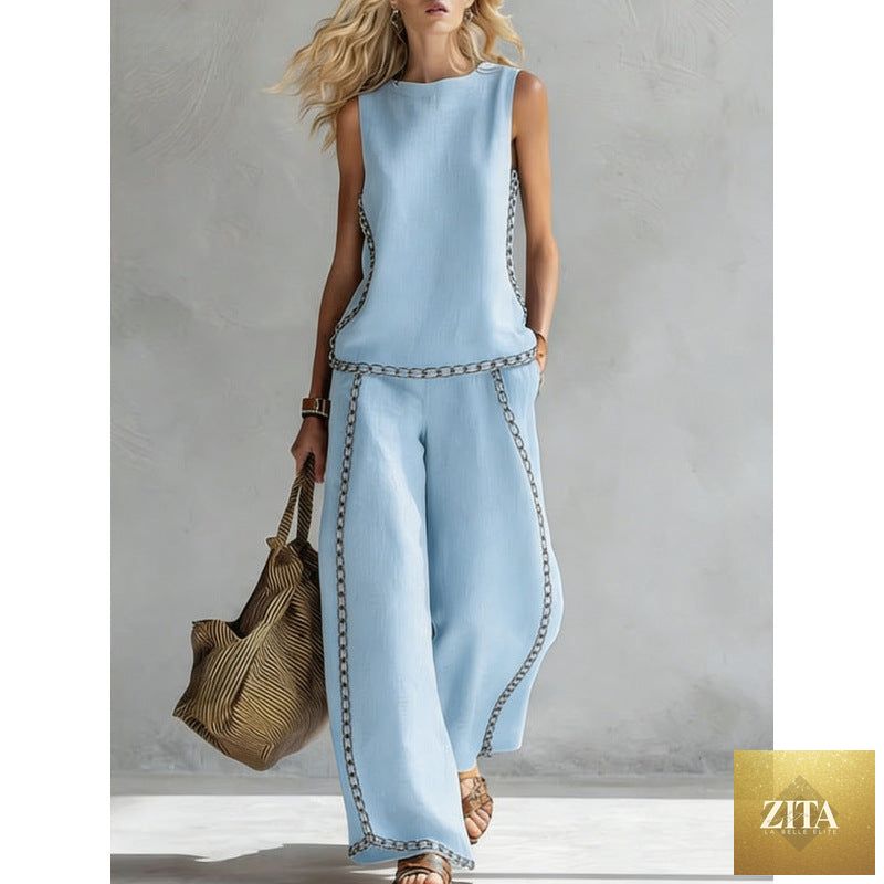Printed retro sleeveless top and wide-leg pants set by MERIDGE, featuring vibrant 12 print designs in sizes S to 5XL.