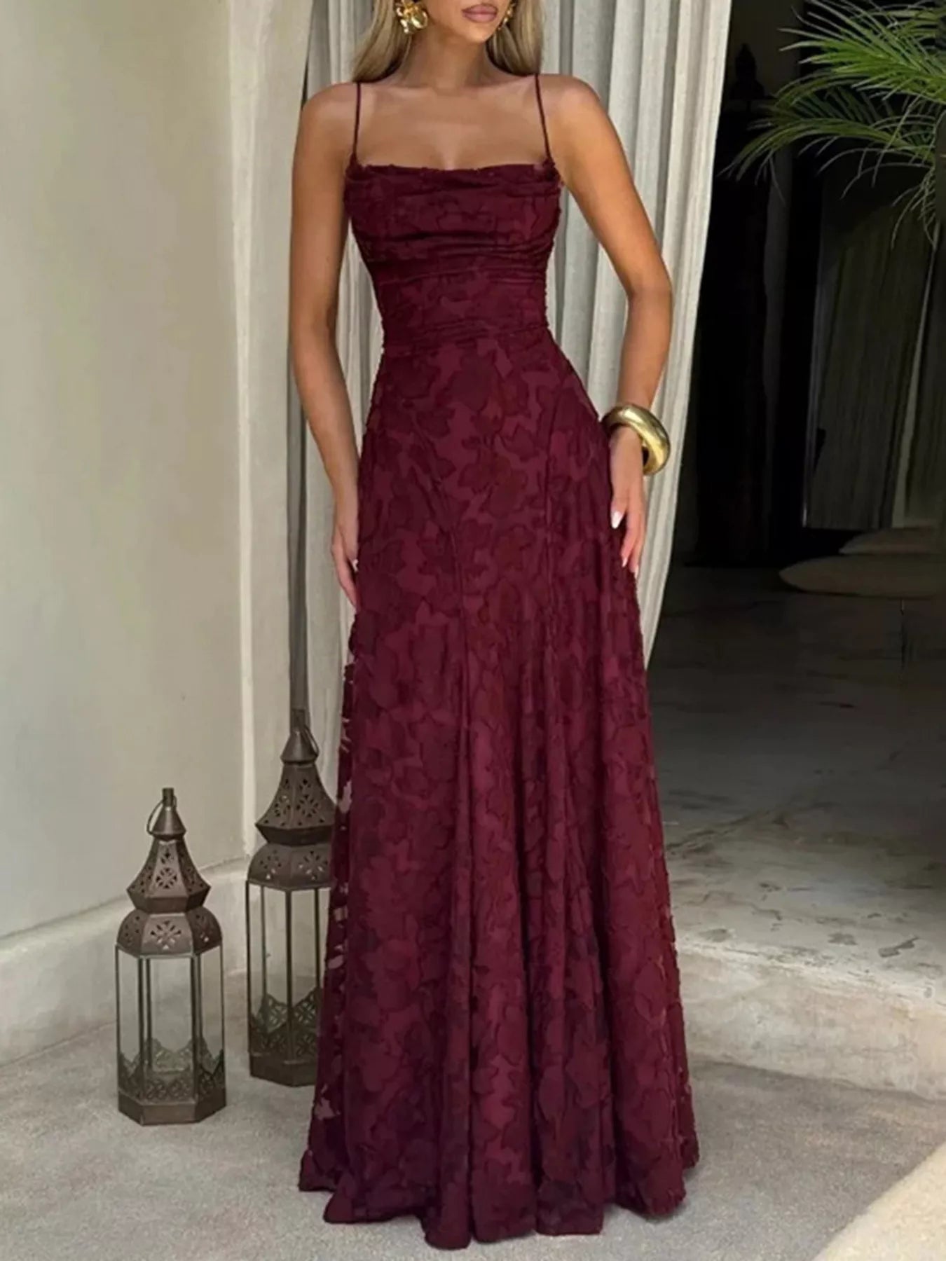 Lace spaghetti strap maxi dress by Shopiebay featuring delicate lace details and a flowing silhouette, perfect for elegant occasions.