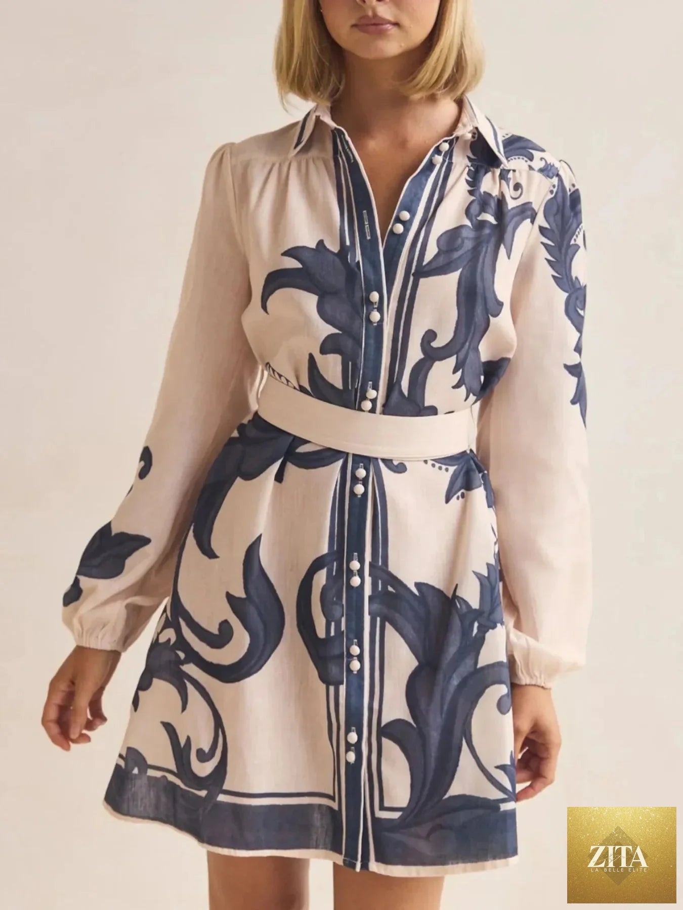 Printed long sleeve shirt dress from Shopiebay featuring a casual, stylish design with a button-up front and collar.