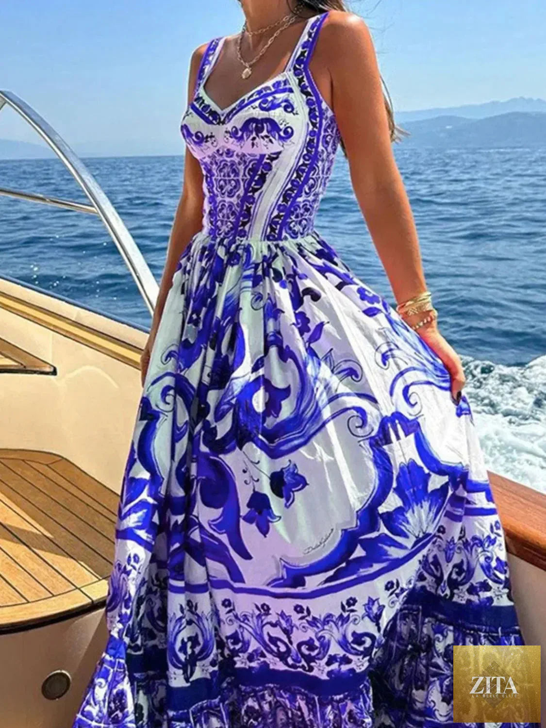 Smocked printed wide strap dress from Shopiebay featuring a colorful floral pattern and a comfortable, flowy design.