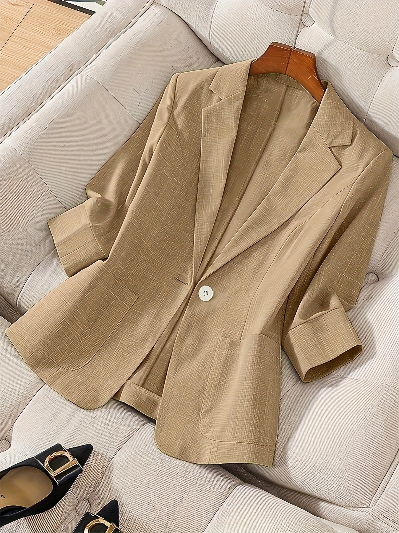 Women's casual blazer with three-quarter sleeves and single-button closure, stylish FitiqueFit coat perfect for everyday wear.