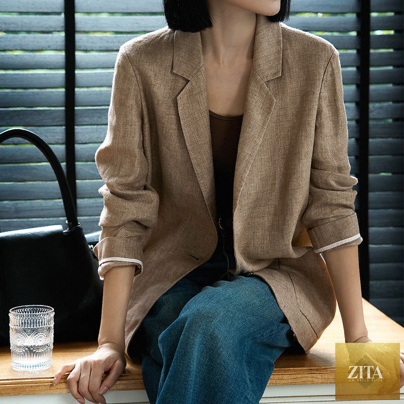 Women's single-breasted tailored blazer by Sell My Stuff, featuring a fitted design and classic lapel in a neutral color.