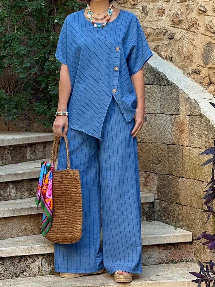 Striped casualwear shirt and loose pants set by FitiqueFit, featuring three-quarter sleeves and a relaxed two-piece design.