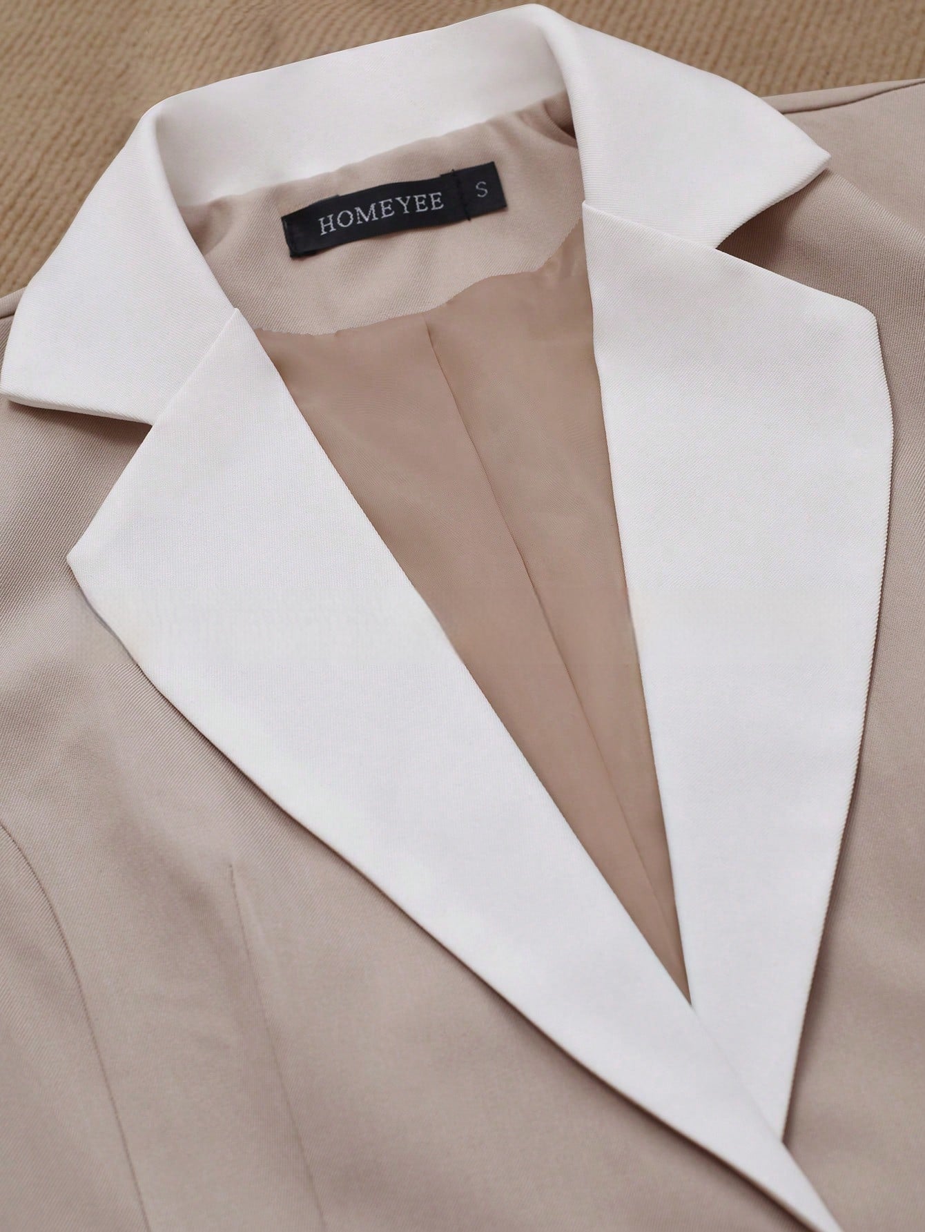 Women’s contrasting color blazer by FitiqueFit, elegant button-up formal jacket with tailored fit and stylish design.