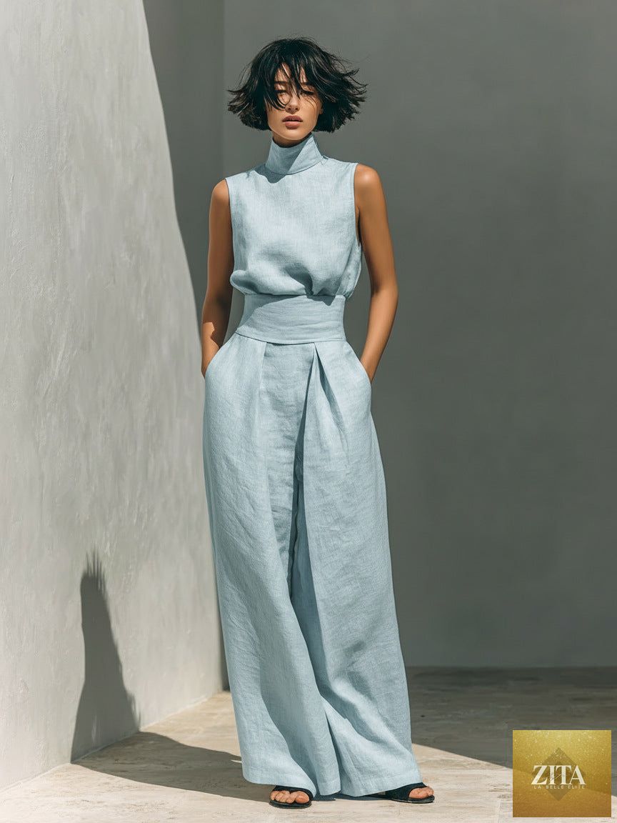 Women's linen-blend high-neck sleeveless top and wide-leg pants set by MERIDGE, shown on a model in a casual indoor setting.