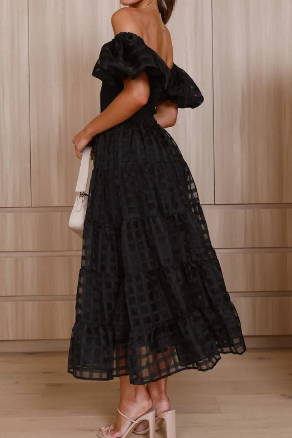 Off shoulder short puff sleeve midi dress by Shopiebay, featuring a stylish, flowy design with feminine details and a fitted waist.