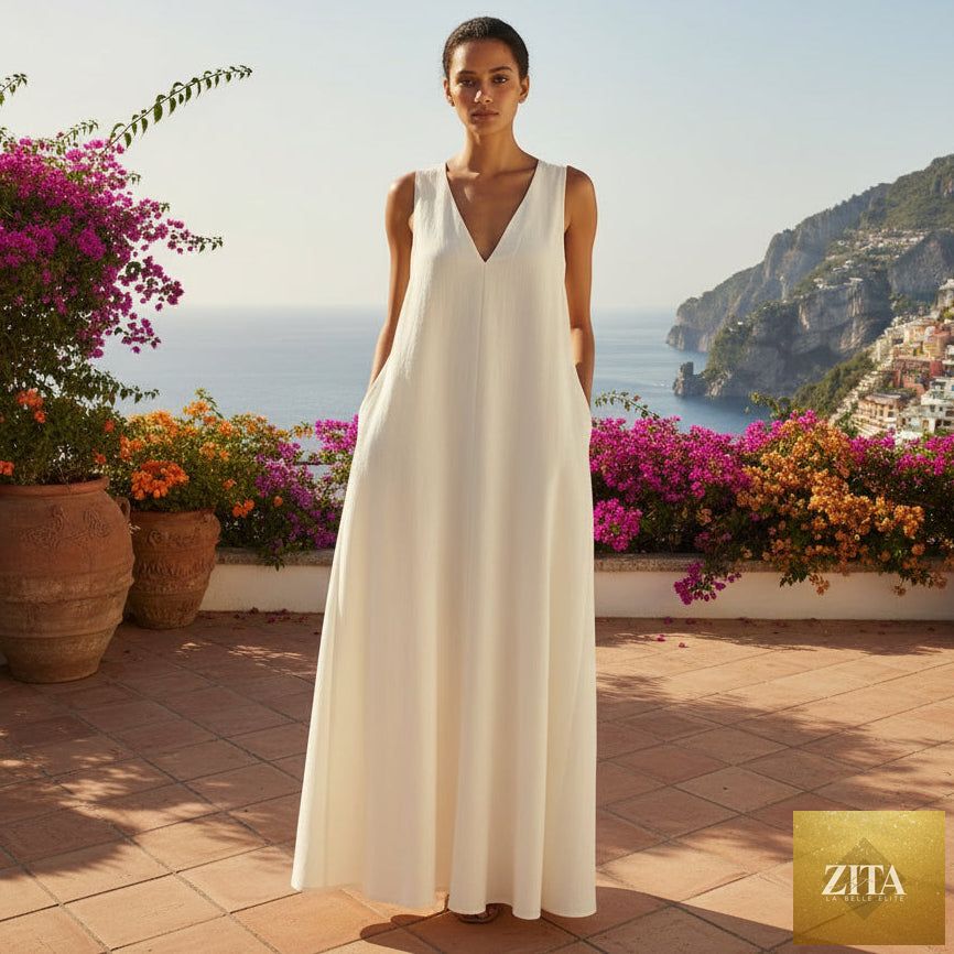 Women's sleeveless stand-collar maxi dress by MERIDGE, featuring a flowy design and elegant fit, shown on a model.