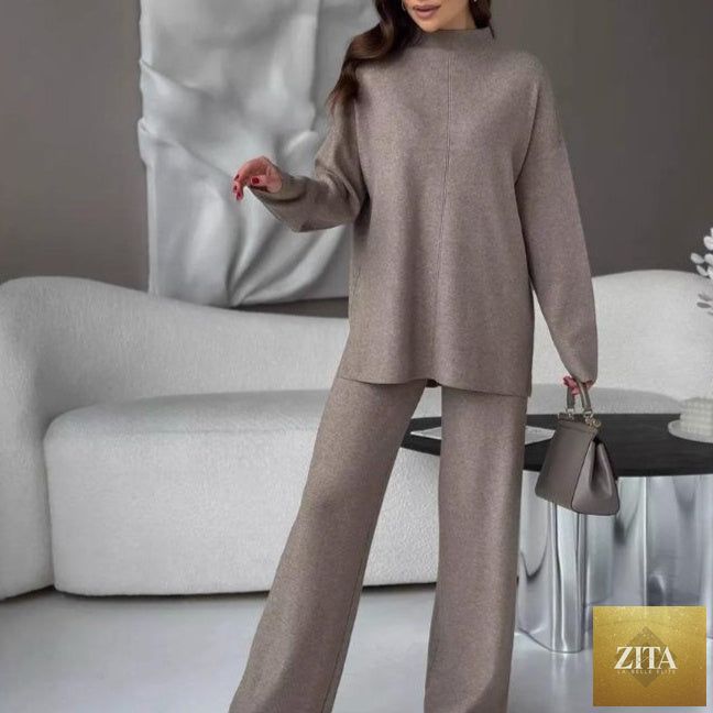 Women's fine-knit mock-neck oversized tunic top and wide-leg trouser set by MERIDGE, shown in water-colored fabric.