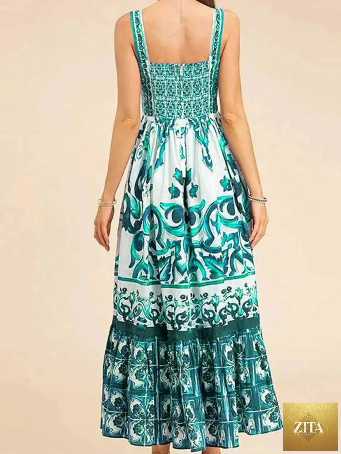 Smocked printed wide strap dress by Shopiebay, showcasing a flowy, colorful design with wide straps and smocked bodice.