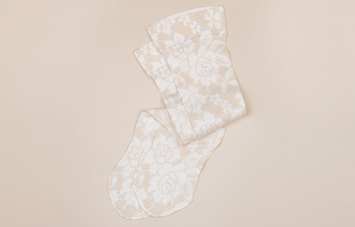 LympheDIVAs Darling Fair gradient compression socks with colorful striped pattern and comfortable fit.