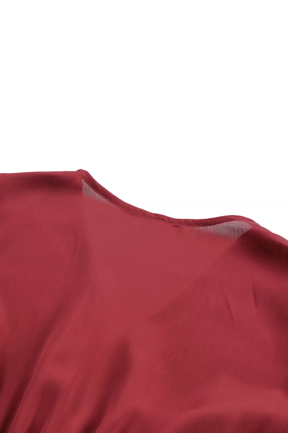 Elegant tie-front ruffle mini dress with smocked waist from Shopiebay, featuring a flattering fit and feminine detailing.