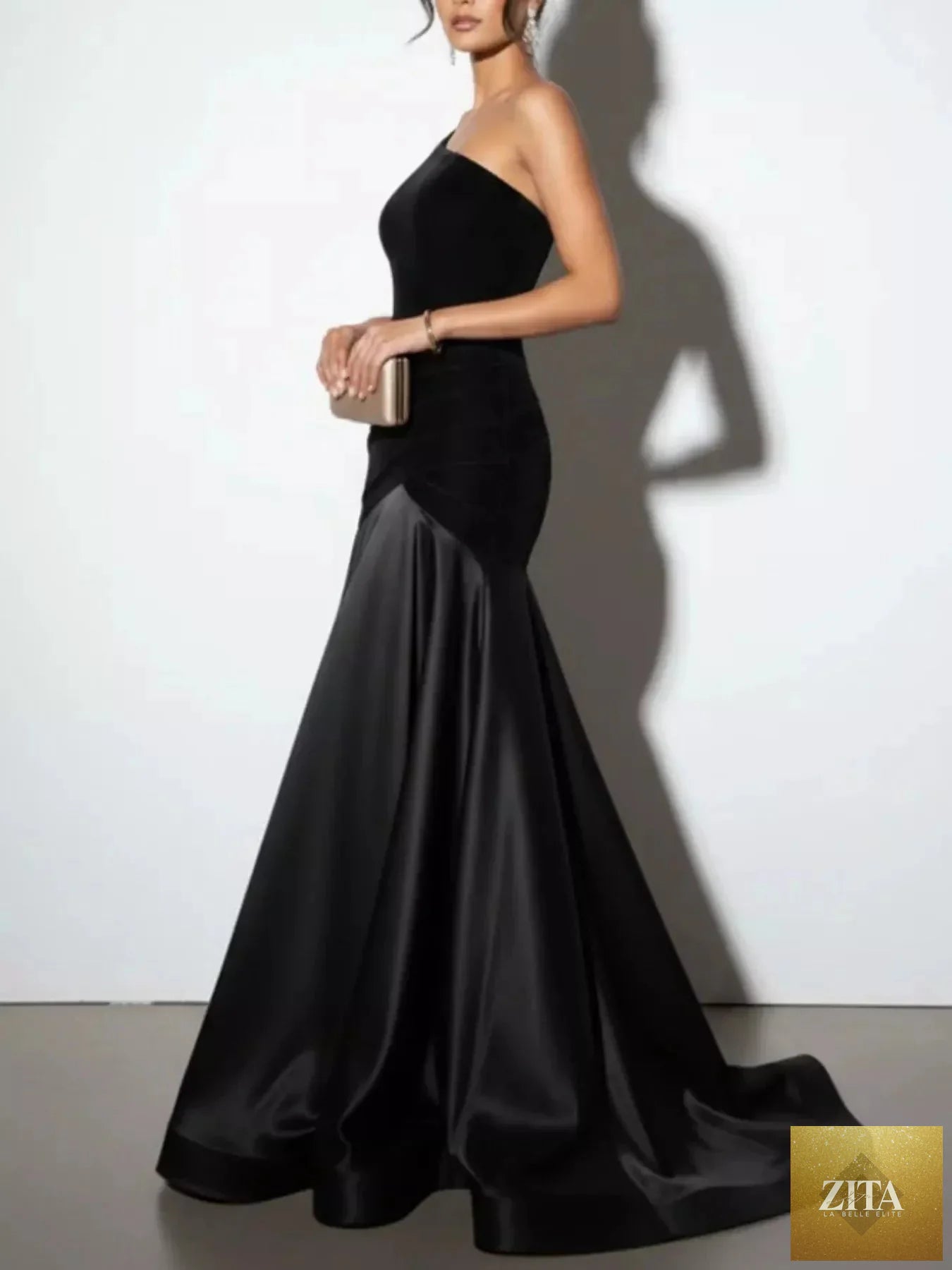 Elegant single shoulder floor-length dress by Shopiebay showcasing flowing fabric and stylish design for formal occasions.