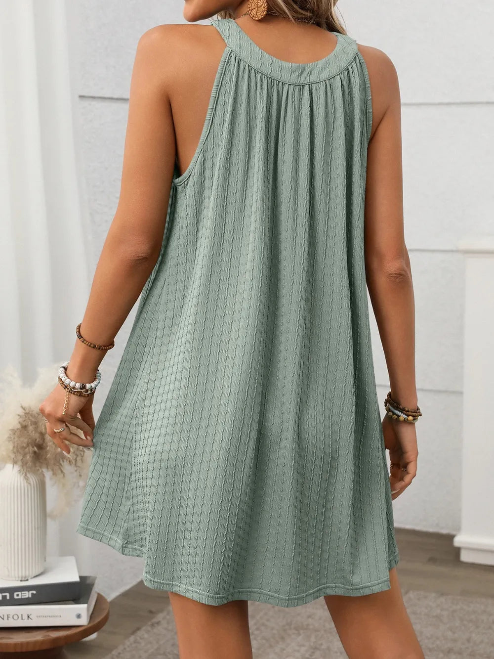 Textured Grecian Neck mini dress from Shopiebay featuring a fitted silhouette and elegant design, shown on a model.