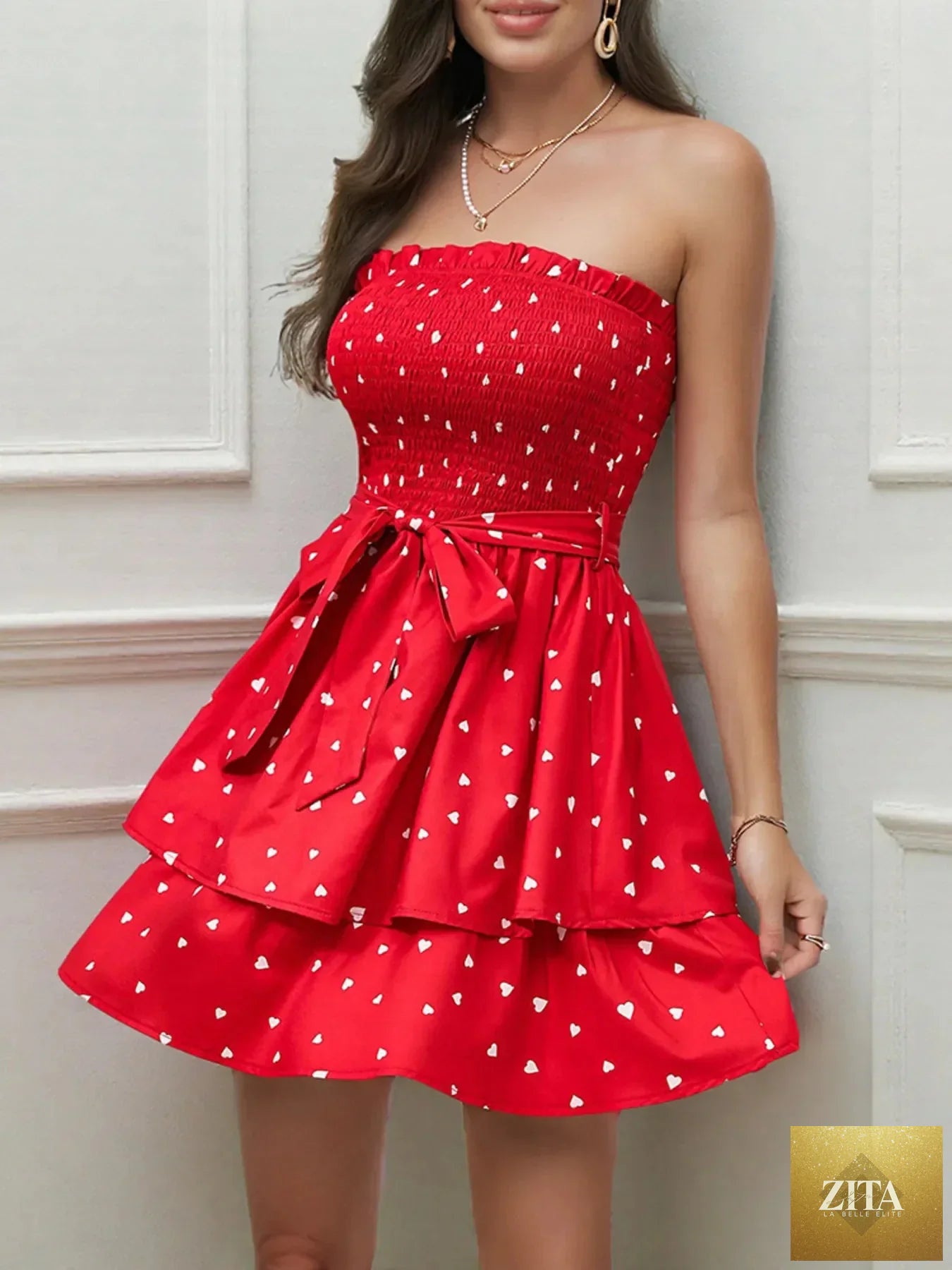 Smocked heart print tube dress by Shopiebay featuring a fitted bodice and vibrant heart pattern, perfect for summer wear.