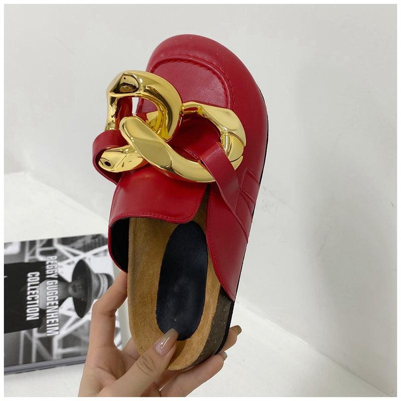 Stevvex women's slip-on slides with metal chain detail, closed round toe, low heels, casual flat loafer style in gold.