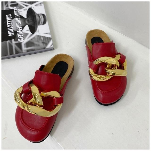 Stevvex women's slip-on casual sandals with closed round toe, low heels, gold chain detail, and flat loafer style.
