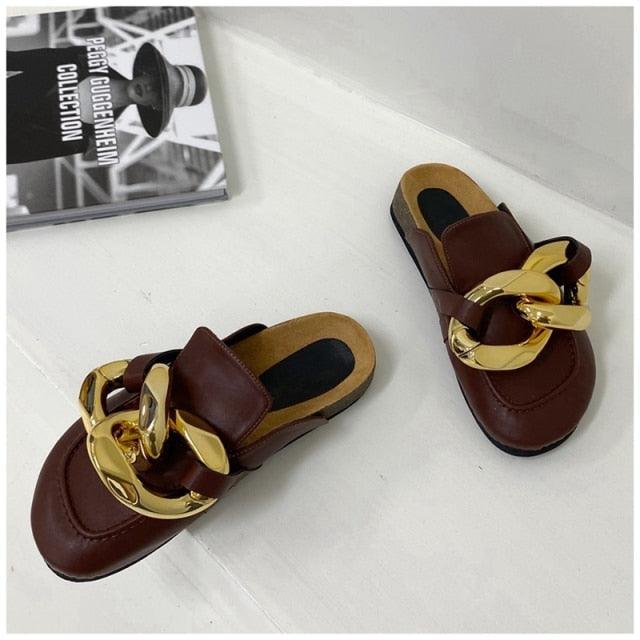 Stevvex women's casual slip-on slippers with closed round toe, low heels, gold chain detail, and flat loafer style.