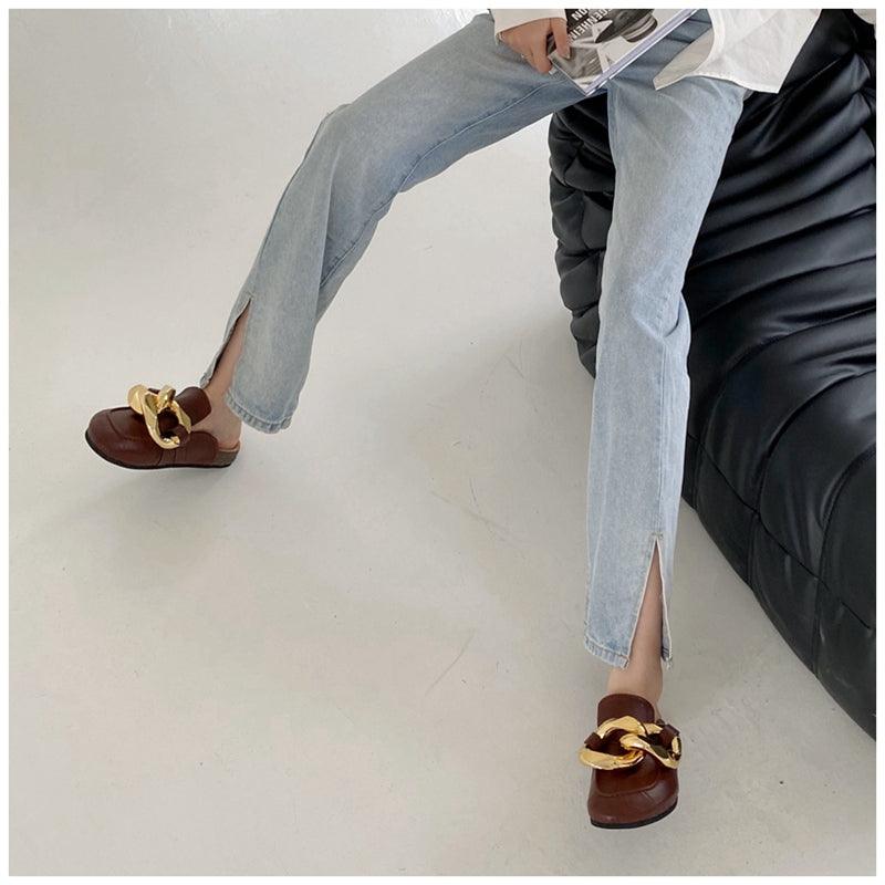 Stevvex women's slip-on flats with a metal chain design, closed toe, round toe, low heels, and casual slide sandal style.