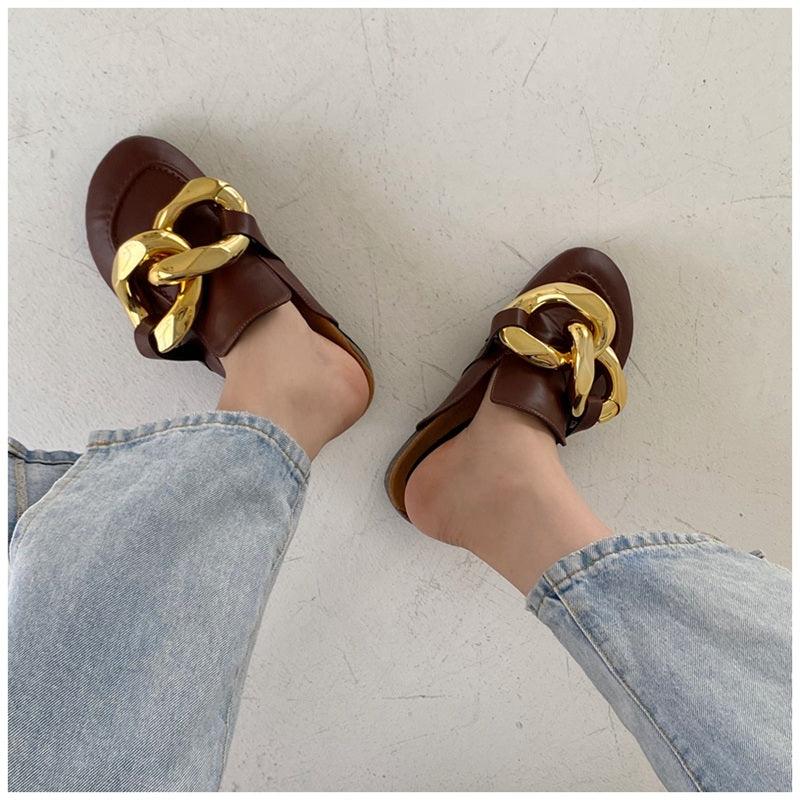 Stevvex women's slip-on flats with metal chain detail, closed round toe, low heels, casual slide sandals in gold.
