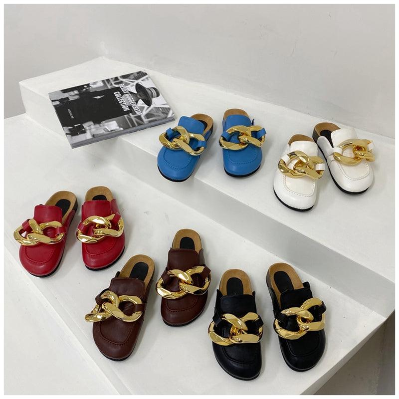 Stevvex women's slip-on flats with gold chain detail, closed round toe, low heels, casual slide sandals, and loafer style.