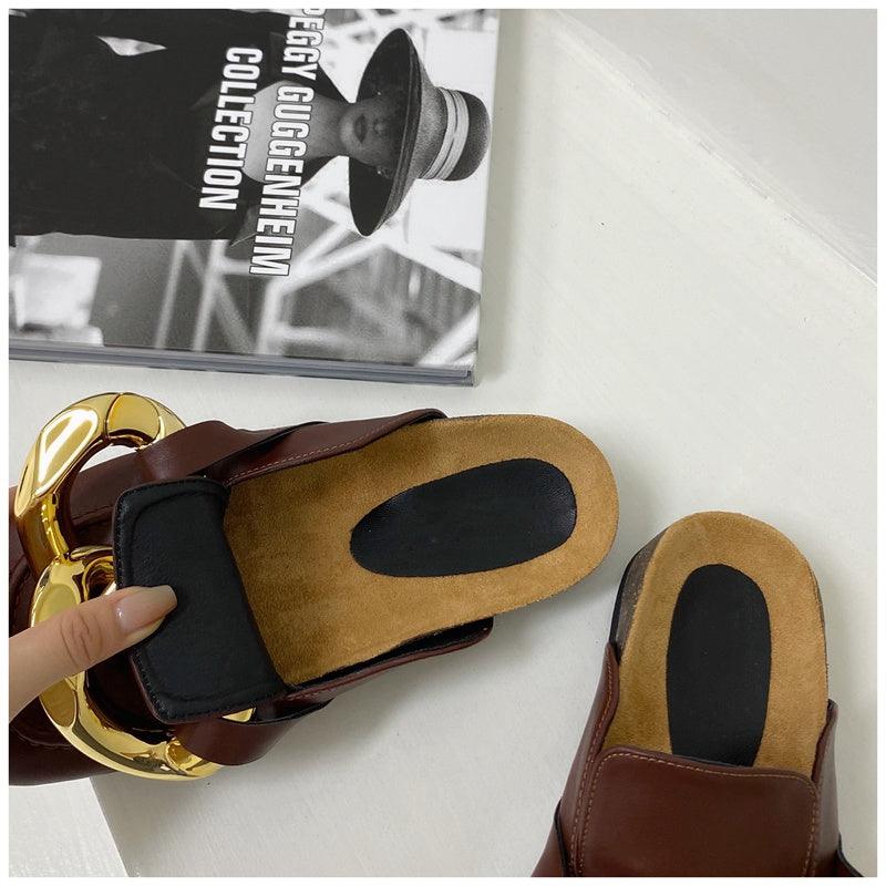 Stevvex women's slip-on slippers with metal chain design, closed round toe, low heels, and casual flat slide sandal style.