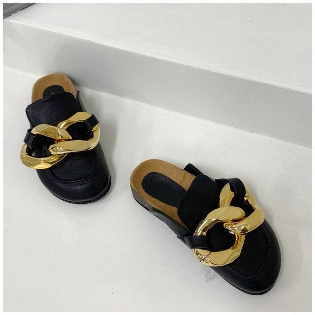Stevvex women's slip-on casual shoes with metal chain design, closed round toe, low heels, and gold accents.