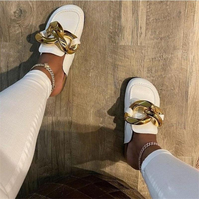 Stevvex women's closed-toe slip-on flats with elegant metal chain design, round toe, low heels, casual slide sandals, gold accents.