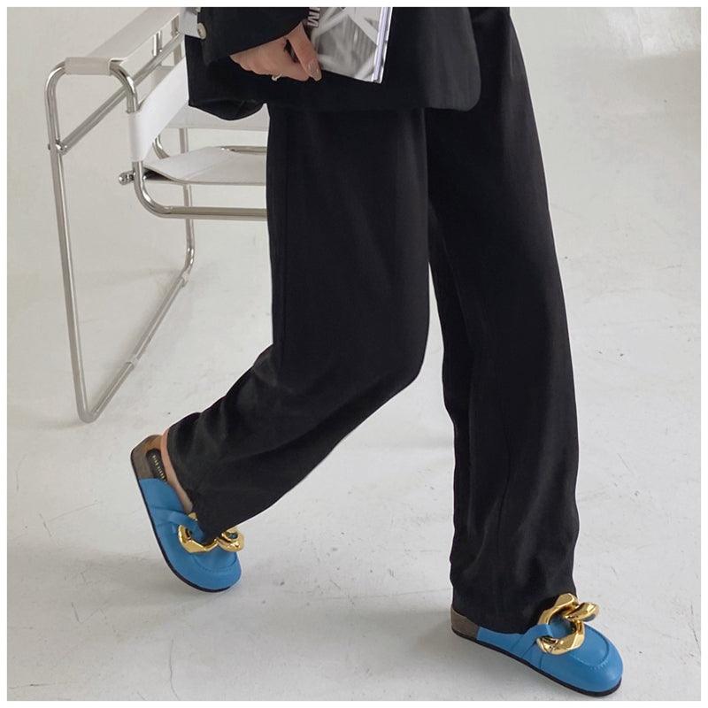 Stevvex women's slip-on flats with metal chain design, closed toe, round toe, low heels, casual slide sandals in gold.