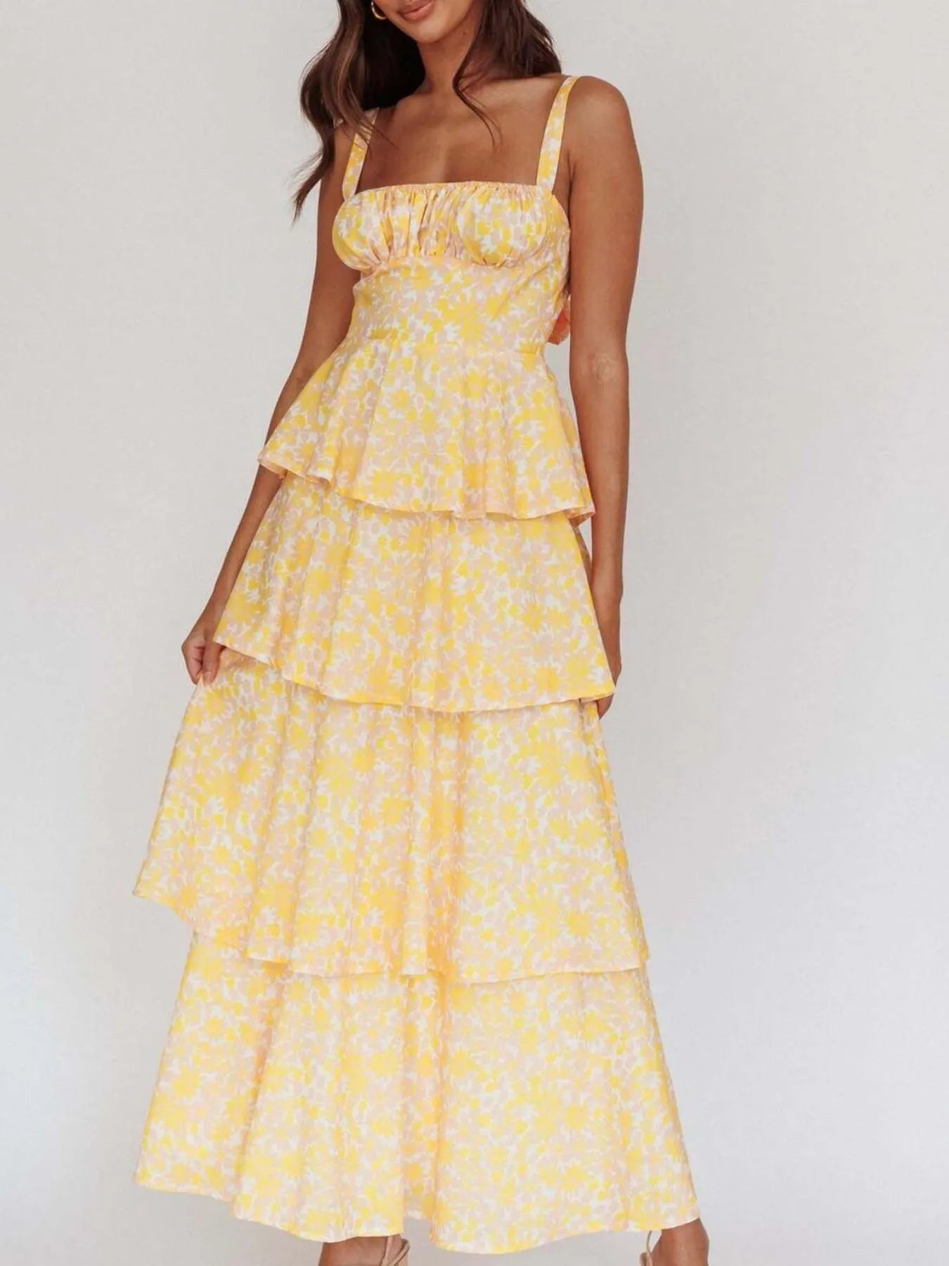 Floral layered ruffle maxi dress by Shopiebay featuring a flowing silhouette and vibrant floral pattern.