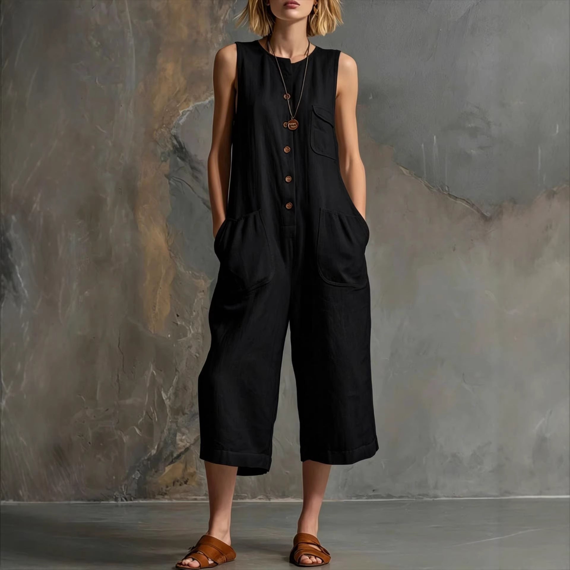 Women's retro sleeveless wide-leg cropped jumpsuit by FitiqueFit, featuring a casual, vintage-inspired style with a relaxed fit.