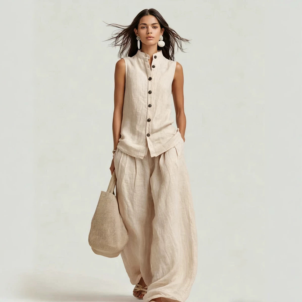 Women's casualwear set featuring a sleeveless stand collar top and high-waist wide-leg pants by FitiqueFit.