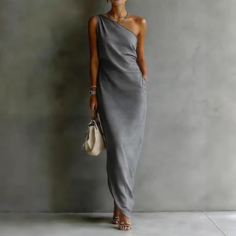 Women's satin off-shoulder slim-fit maxi dress by FitiqueFit, featuring a flowing silhouette and elegant off-shoulder design.