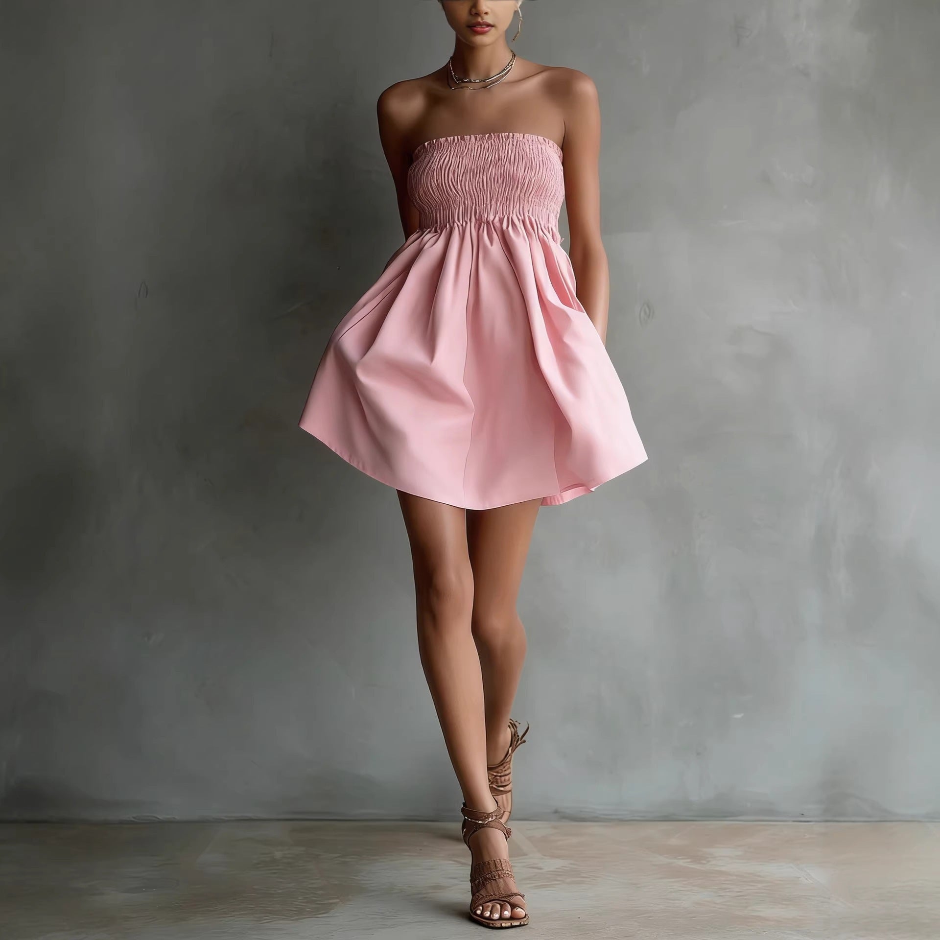 Women's strapless tube mini dress by FitiqueFit featuring a solid color and elastic waist, perfect for casualwear.