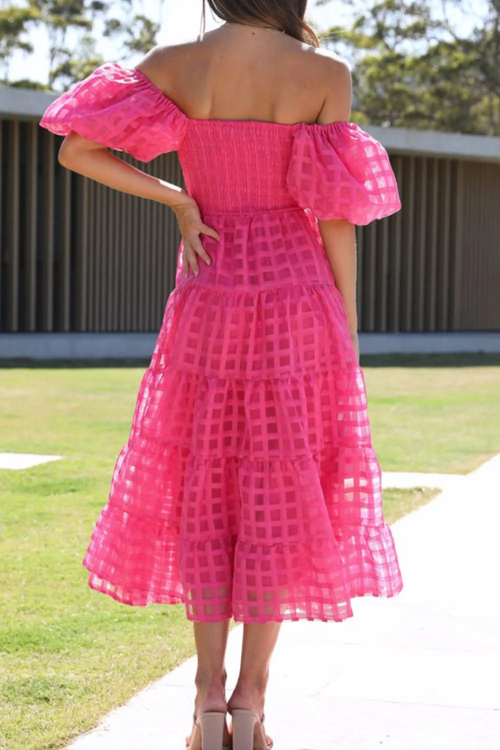 Off-shoulder short puff sleeve midi dress by Shopiebay, featuring a flowy silhouette and elegant design for casual or formal wear.