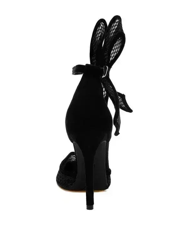 Femstylo Regenta women's stiletto sandals with large bow detail, stylish open-toe design, perfect for dressy occasions.