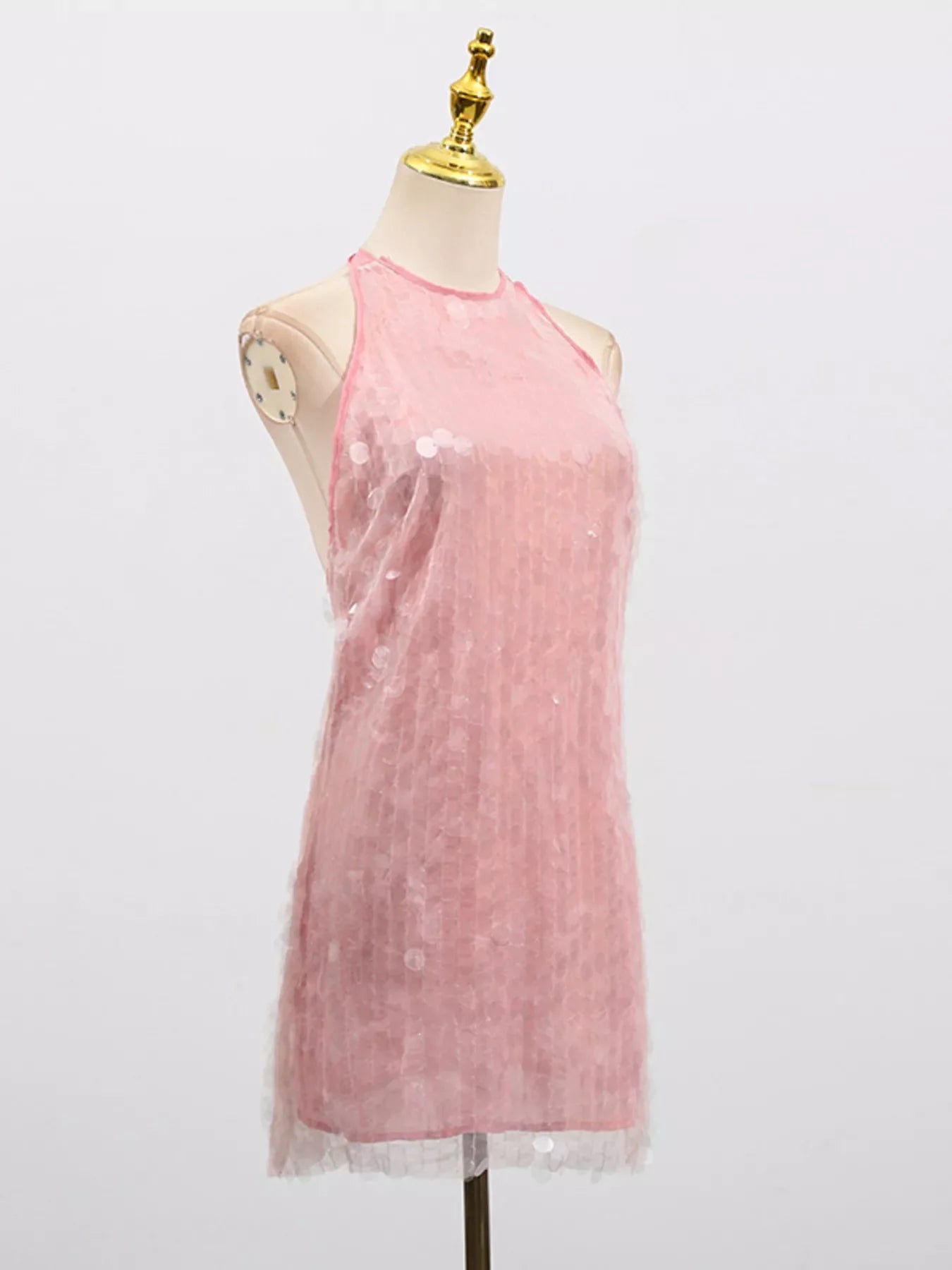 Sequin halter neck mini dress by Shopiebay featuring shimmering sequins and a fitted silhouette, perfect for evening wear.