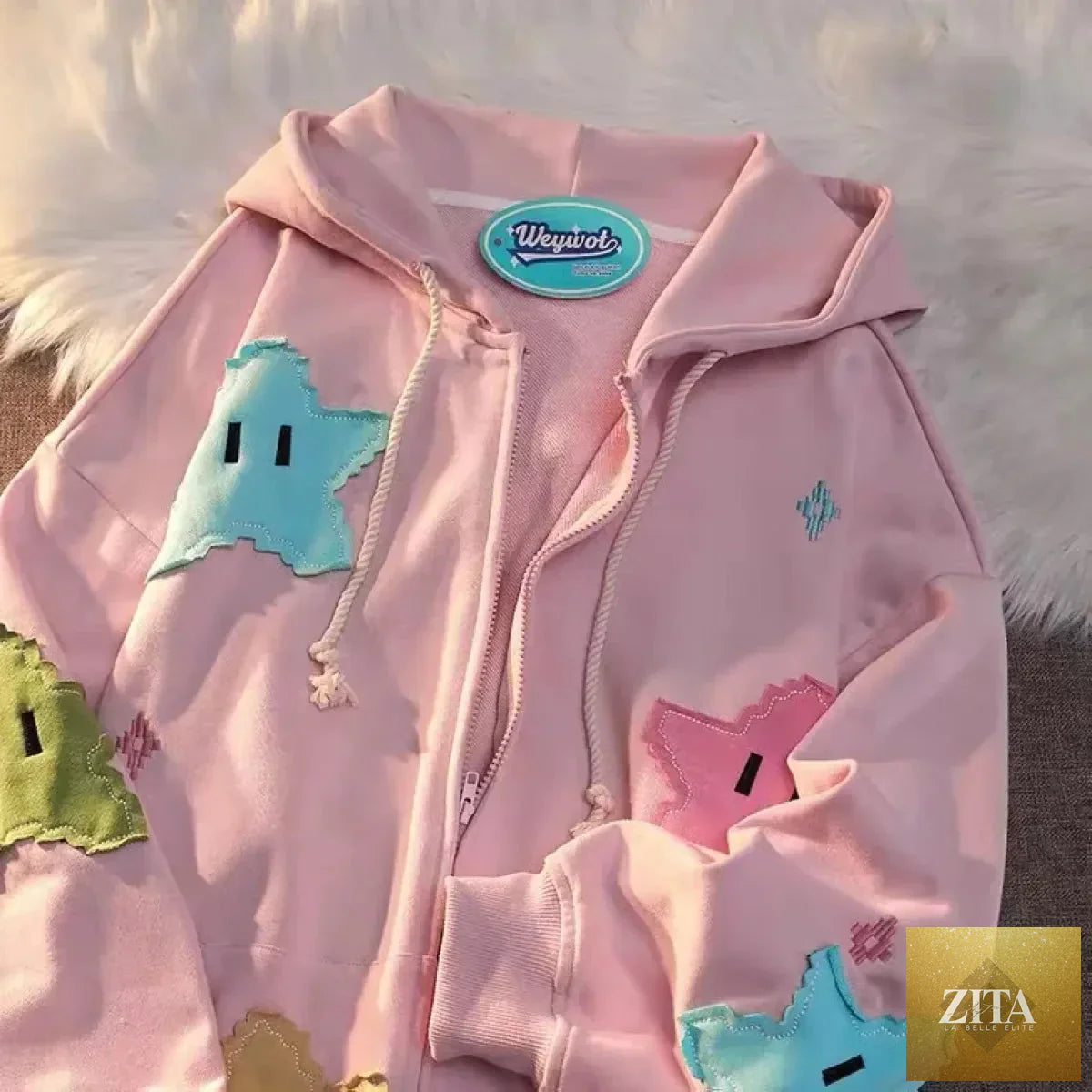 Kawaii Stop Overslide Kawaii Stars Hoodie showing a cozy, oversized hoodie with star patterns and a slight stretch fit.