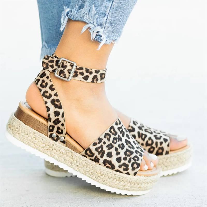 Stevvex women's leopard high heel platform sandals with thick soles, adjustable straps, belt buckle, perfect for summer fashion.