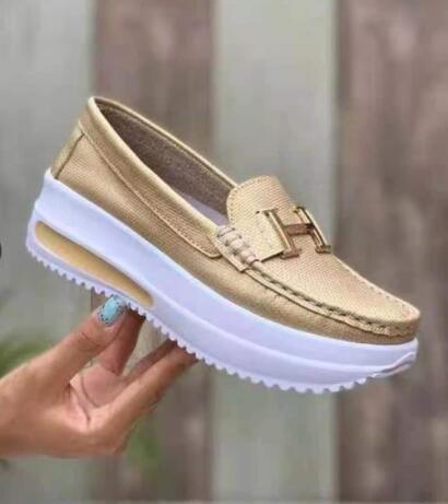 Stevvex women's white lace-up casual sneakers with elastic sides, comfortable flat espadrille style for walking and everyday wear.