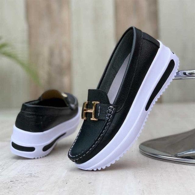 Stevvex women's white lace-up casual sneakers with elastic sides, ideal for walking and spring comfort.