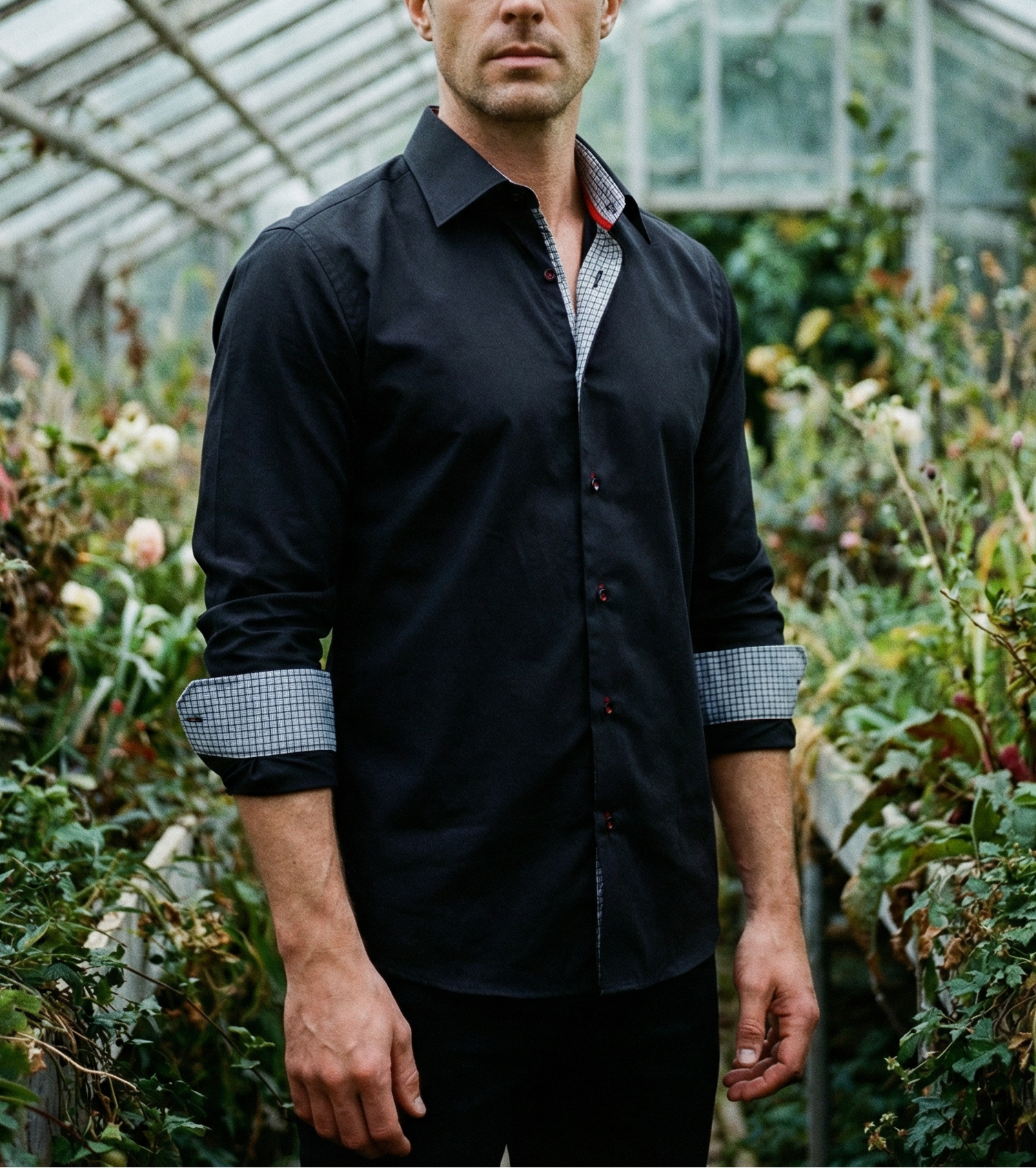 Man wearing black LEVINAS® cotton knit-stretch button-up shirt with contrast details, tailored fit, and long sleeves.