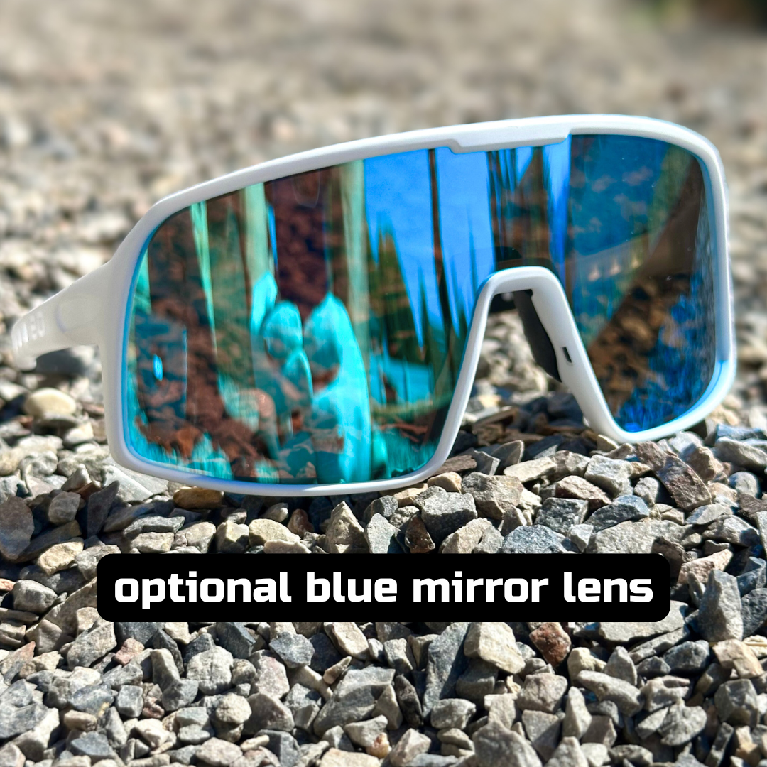 Eastern Outer Mojave sunglasses with photochromic lenses, featuring white frames and optional blue lenses, shown in the image.