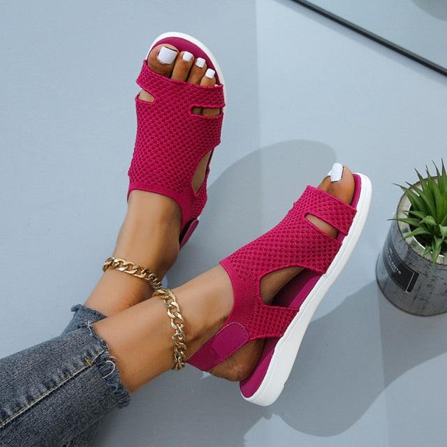 Blue Stevvex women's summer sandals with buckle strap, open toe, slip-on flat design, perfect for casual beach and dressy wear.