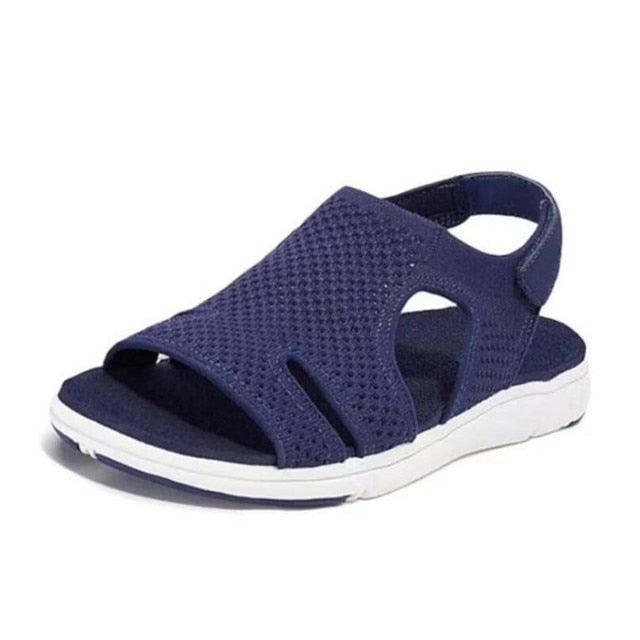 Blue casual women’s summer sandals by Stevvex with buckle strap, open toe, slip-on flat design, perfect for beach or dressy casual wear.