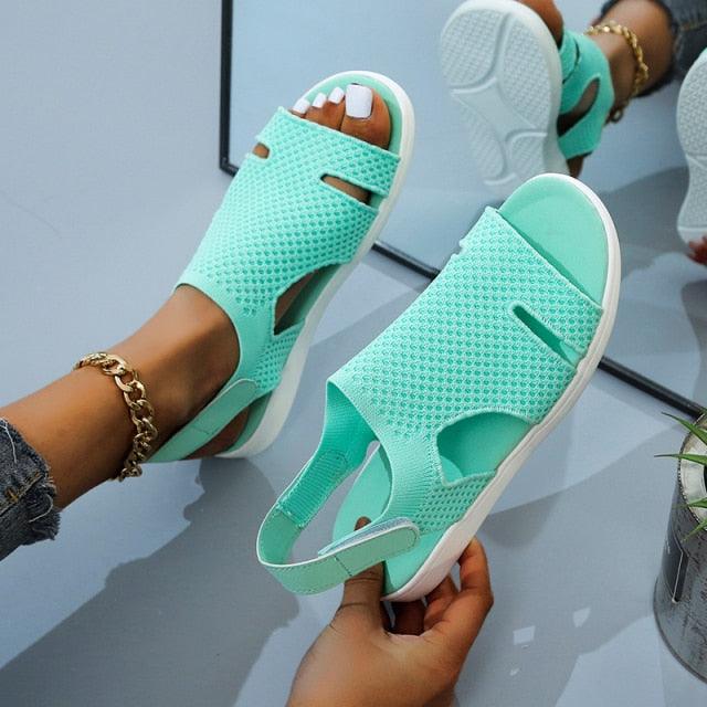 Blue casual women’s summer sandals by Stevvex with buckle strap, open toe, slip-on flat design, perfect for beach or dressy casual wear.