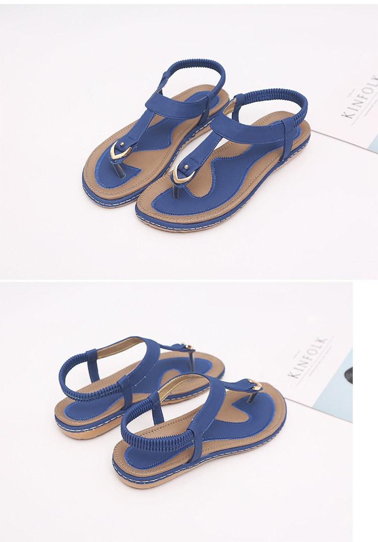 Stevvex women's flat heel summer sandals with T-strap, elastic straps, soft sole, perfect for beach and casual wear.